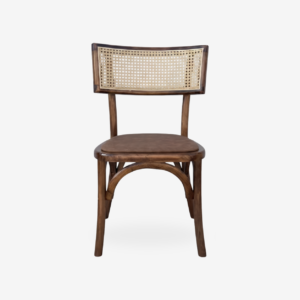 Silla Anya de madera de pino para restaurantes y cafeterías. Respaldo en bejuco sintético y asiento tapizado. Ideal para interiores.